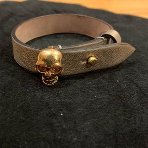 Alexander mcqueen leather bracelet with gold hardware and gold color leather